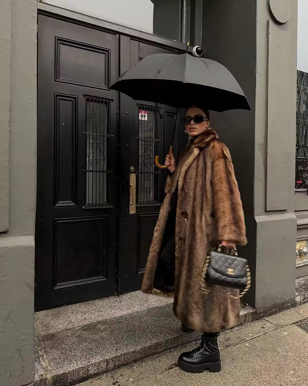Skylar elegant faux fur coat for women with a fluid, enveloping design and luxurious texture.