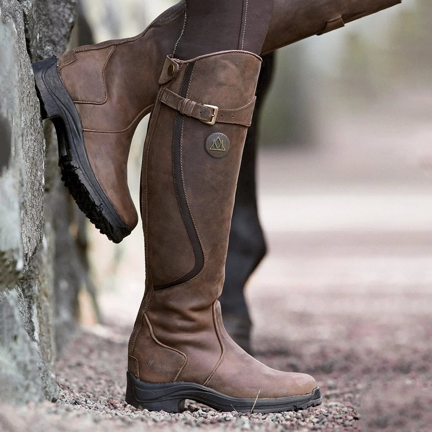 Talia high boots for women with a timeless feminine style and a structured, chunky sole.