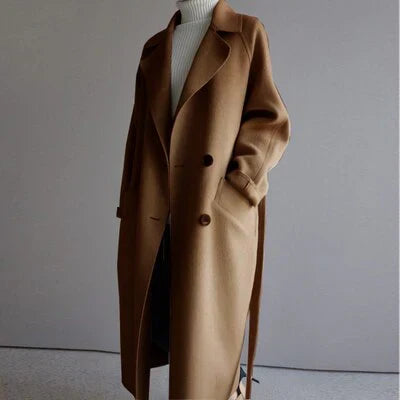 Althea women’s long coat with structured silhouette and minimalist details, chic and versatile design