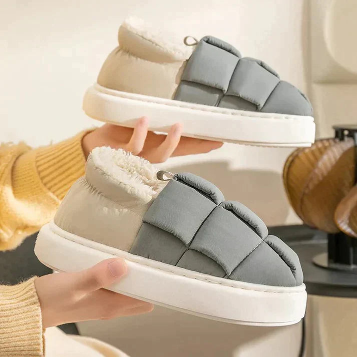 Esme comfortable indoor slippers with a plush, cozy interior and a refined design.