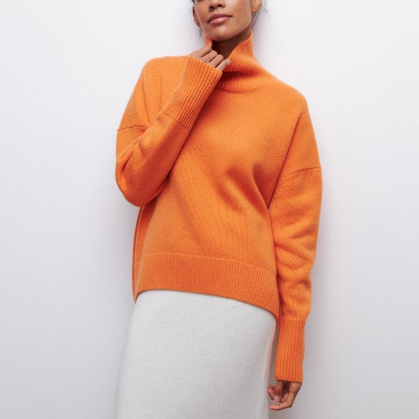 Daphne elegant textured turtleneck sweater for women with a structured silhouette.