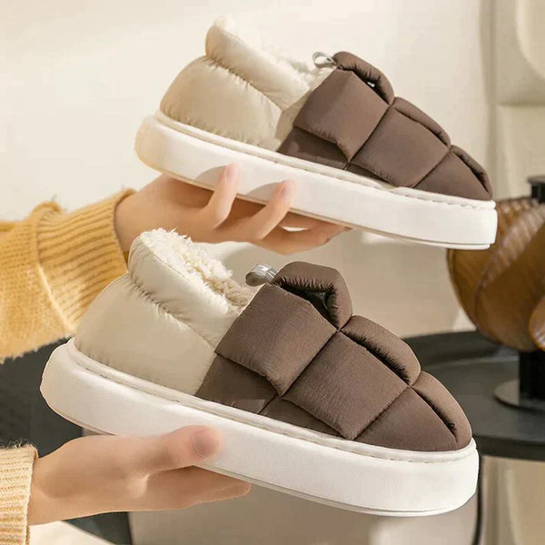 Esme comfortable indoor slippers with a plush, cozy interior and a refined design.