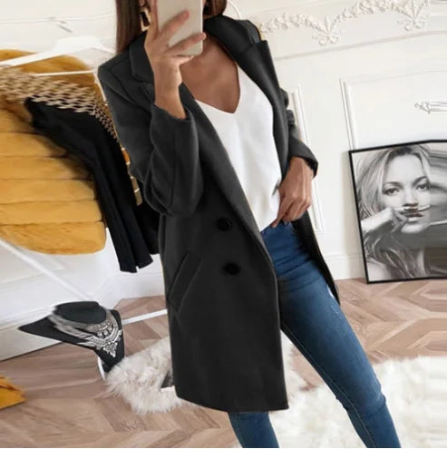Victoria elegant long winter coat for women with a structured silhouette and clean lines.