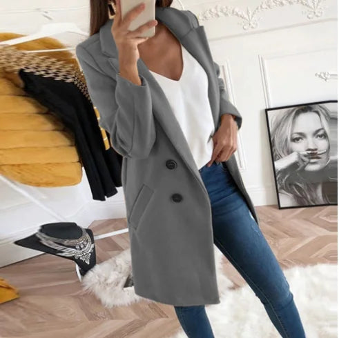 Victoria elegant long winter coat for women with a structured silhouette and clean lines.