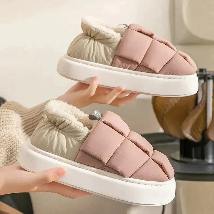 Esme comfortable indoor slippers with a plush, cozy interior and a refined design.