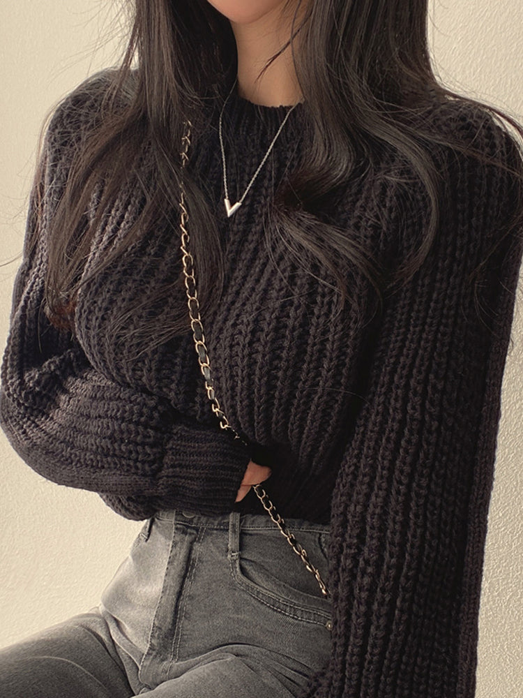 Women’s knitted sweater with braided woven details – round neck