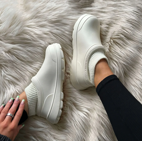 Women’s clog-style socks with slip-on design.