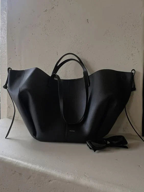 Clarise women’s elegant faux leather handbag with structured silhouette and versatile design
