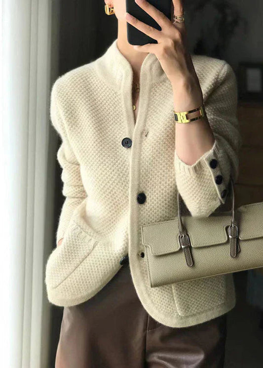 Abigail women's elegant vest with a clean style and decorative buttons on the sleeves.