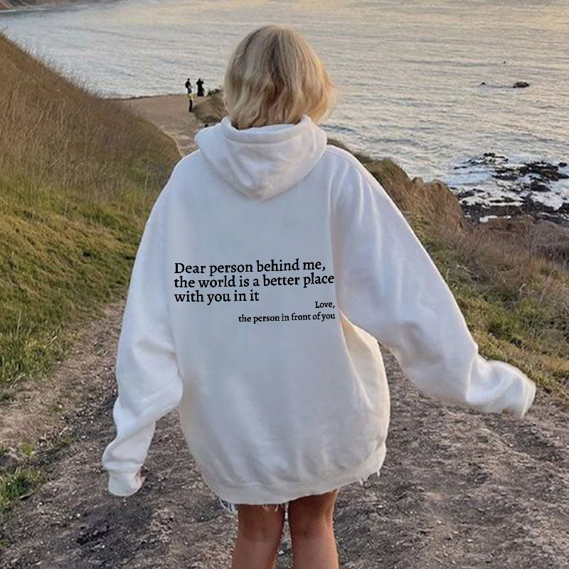 Joy unisex hoodie with an inspiring quote printed on the back.