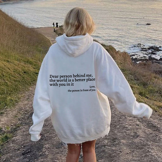 Joy unisex hoodie with an inspiring quote printed on the back.