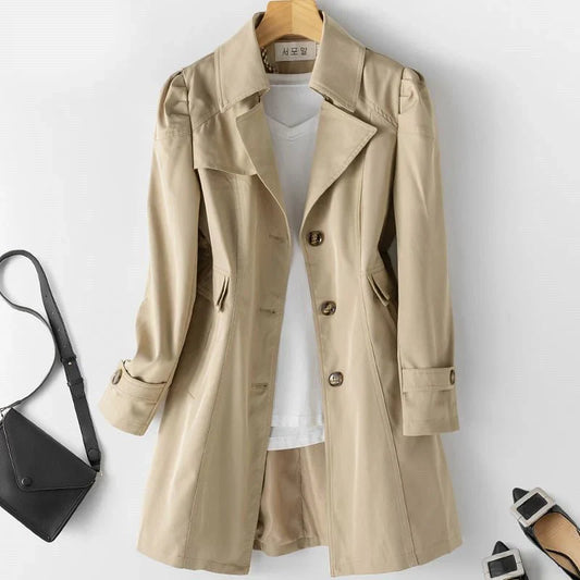 Leila elegant women's jacket with a structured fit, lapel collar, and subtle button details.