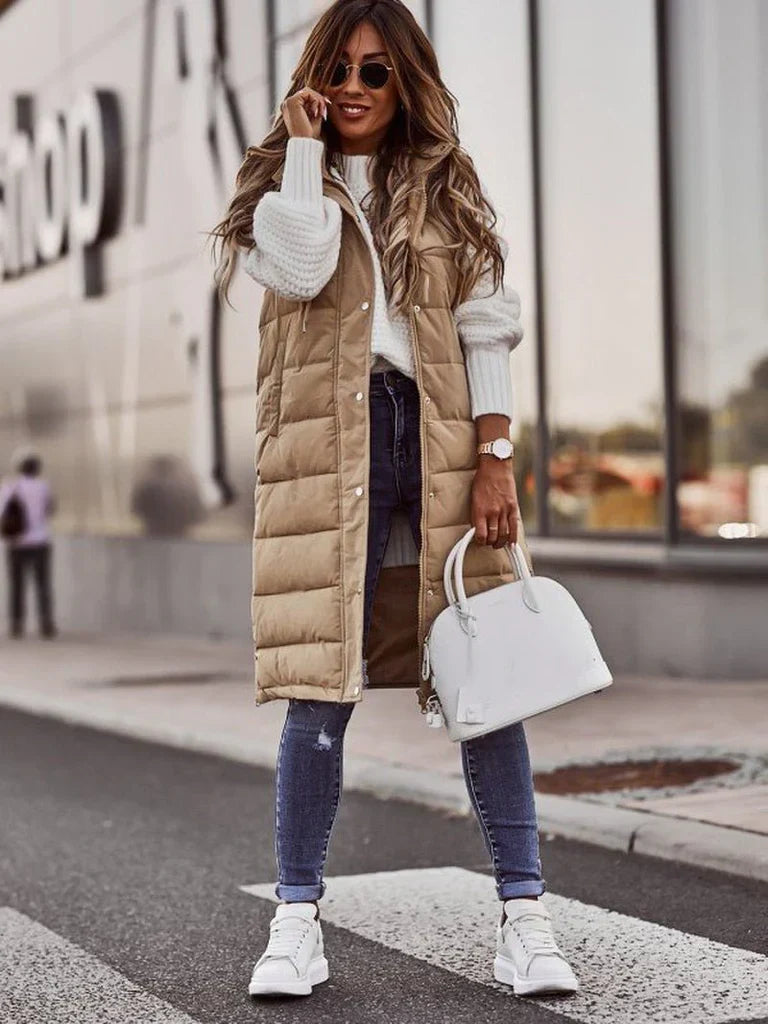 Women’s long quilted gilet with hood – black winter layering vest.