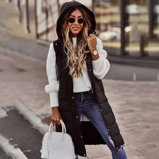 Women’s long quilted gilet with hood – black winter layering vest.