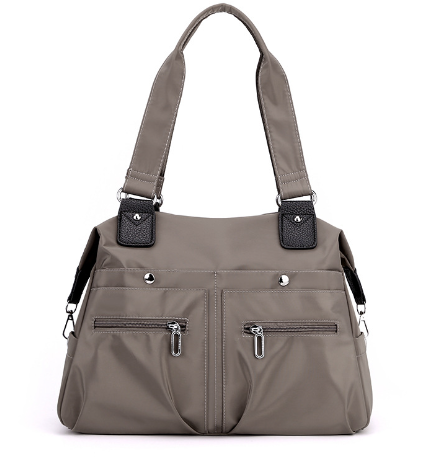 Amelie lightweight handbag with a structured shape and a clean, modern design.