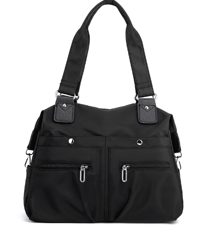 Amelie lightweight handbag with a structured shape and a clean, modern design.