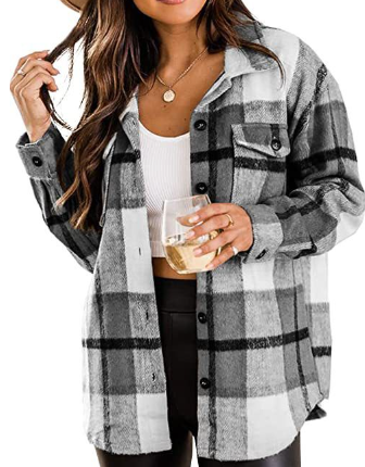 Women’s oversized plaid shirt in red and black check with long sleeves.
