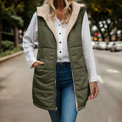 Anya reversible sleeveless jacket featuring one side with textured fleece and the other with a smooth, sleek finish.