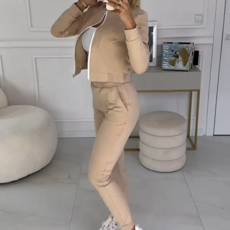 Sienna 3-piece tracksuit for women, with a zip-up hooded jacket, matching top, and comfortable pants.