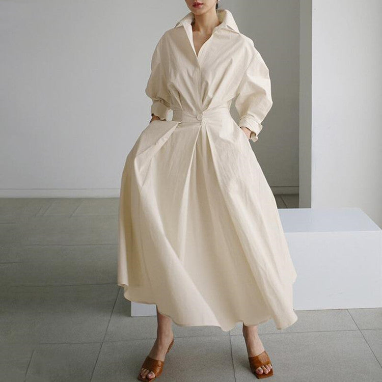 Sasha cotton shirt dress featuring a notched collar and a fluid, feminine wrap design.