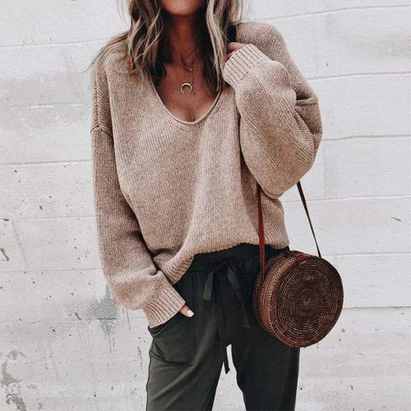 Iris women’s oversized V-neck knit sweater with relaxed silhouette, soft knit fabric, casual yet elegant style