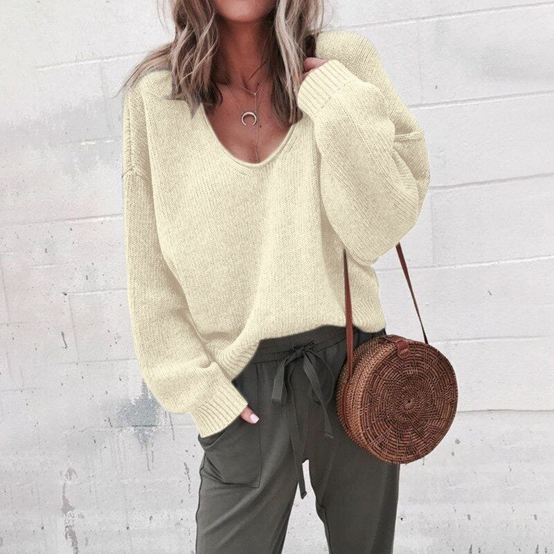 Iris women’s oversized V-neck knit sweater with relaxed silhouette, soft knit fabric, casual yet elegant style