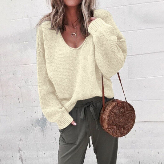 Iris women’s oversized V-neck knit sweater with relaxed silhouette, soft knit fabric, casual yet elegant style