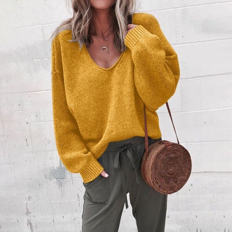 Iris women’s oversized V-neck knit sweater with relaxed silhouette, soft knit fabric, casual yet elegant style